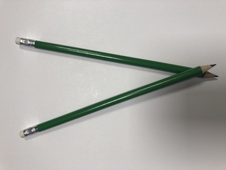 Green pencil with white eraser